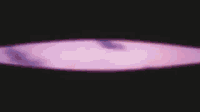 a purple background with clouds in the sky