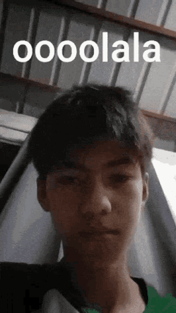 a young man 's face is shown with the words oooolala above it