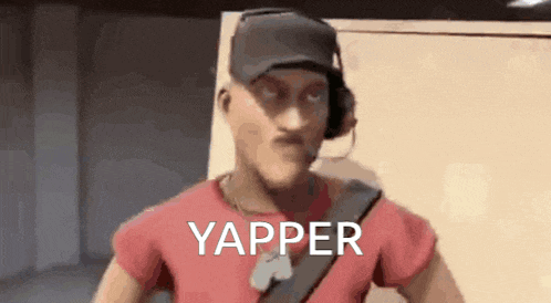 a man wearing headphones and a red shirt is standing in a room .