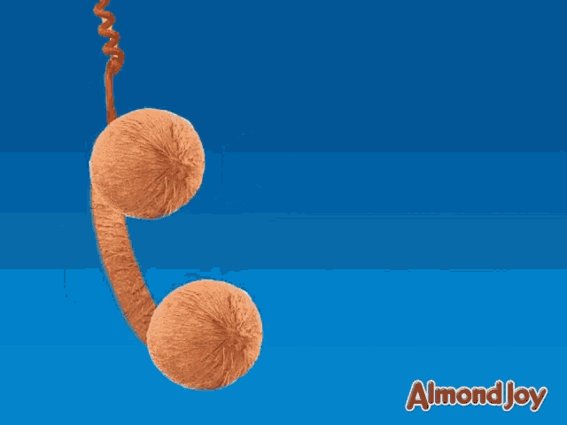 an advertisement for almond joy shows a phone with a speech bubble that says call me