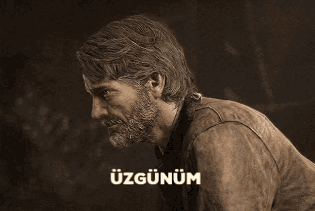 a man with a beard is looking down with the words " uzgunum " written above him
