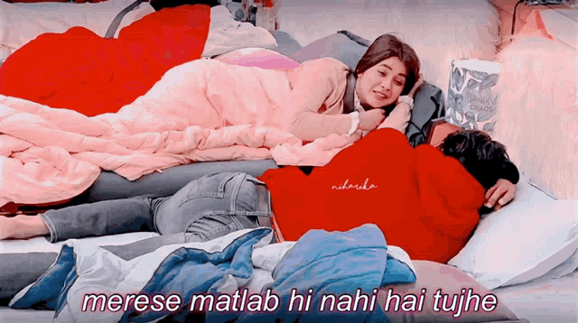 a couple laying on a bed with a caption that says merese matlab hi nahi hai tujhe