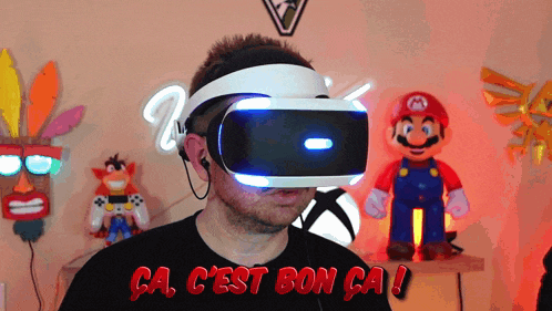 a man wearing a virtual reality headset says " ca c'est bon ga "