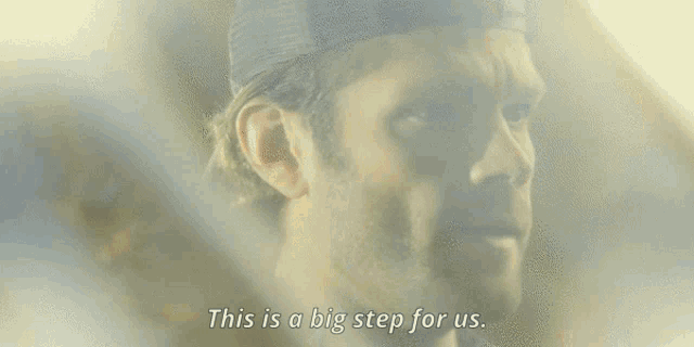 a close up of a man with the words " this is a big step for us " below him