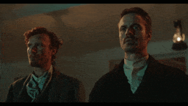 two men standing next to each other with j ' vais tuer tous ces fumiers written on the screen