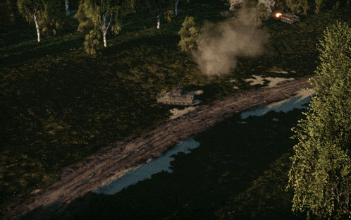 an aerial view of a tank exploding in the middle of a dirt road