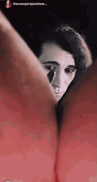 a close up of a person 's face with the words the vampire jacktow at the top