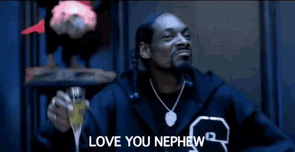 snoop dogg is wearing a fur coat and tie and says i love you nephew