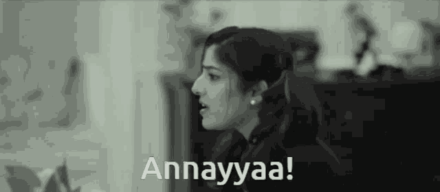 a black and white photo of a woman with the words annayyaa written on the bottom