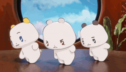 three white cartoon bears are standing in front of a window