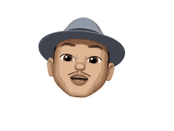 a cartoon face of a man wearing a blue hat and smiling .