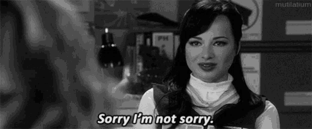 a woman is saying sorry i 'm not sorry .