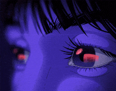a close up of a person 's eye with a glowing red pupil