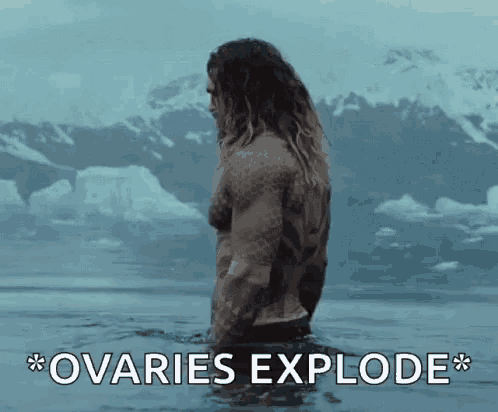 a man is standing in the water with the words " ovaries explode " on the bottom