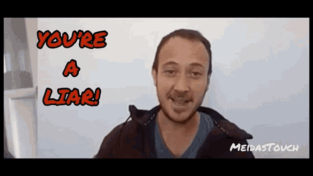 a man says you 're a liar while smiling