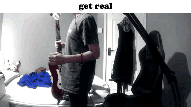 a man playing a guitar in a room with the words " get real " on the bottom