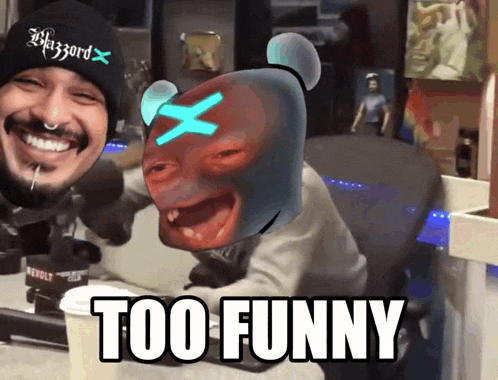 a man wearing a blizzard hat is laughing with a cartoon face behind him that says too funny