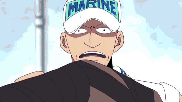 a man is wearing a white hat that says marine
