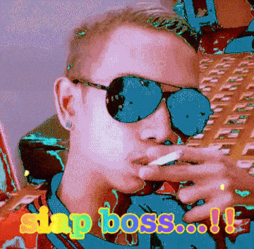 a man wearing sunglasses is smoking a cigarette and says " slap boss "