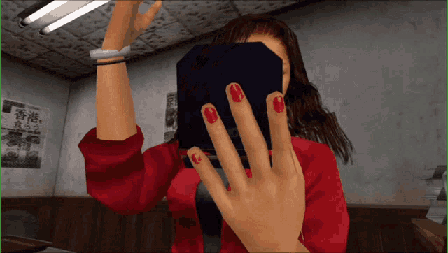 a woman with red nails is covering her face with her hands