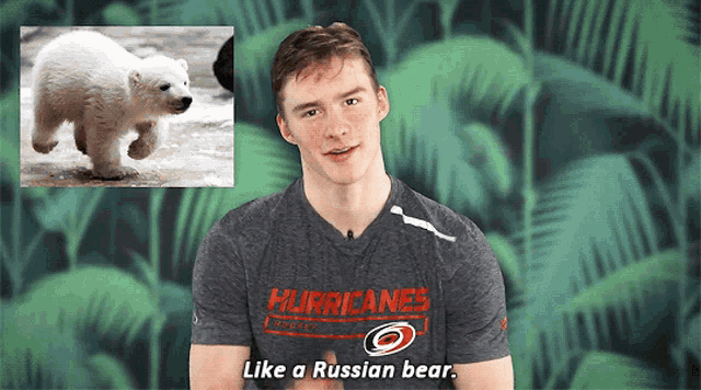 a man in a hurricanes shirt is talking about a polar bear