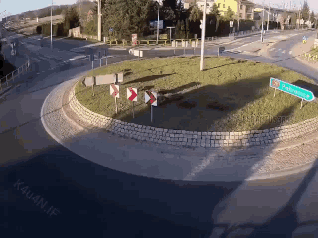 a roundabout in a city with a sign that says ' podgrodzie ' on it