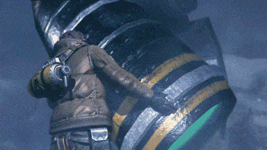 a man with a gun on his back is standing in front of a large cylindrical object