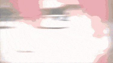 a blurry picture of a person 's face with a red background
