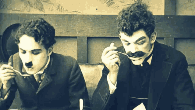 Charlie Chaplin Drinking GIF - Charlie Chaplin Drinking Soup GIFs