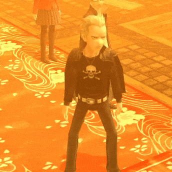 a man with a skull on his shirt is laying on the floor