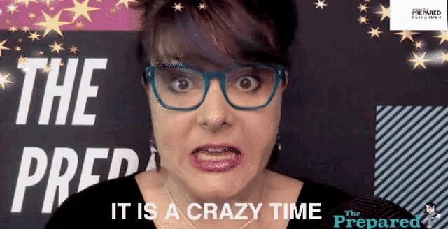 a woman wearing glasses says it is a crazy time in front of a sign that says the prepared
