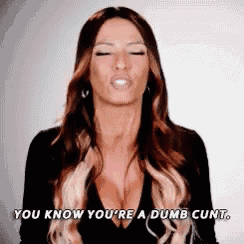 a woman with a very large breast is saying you know you 're a dumb cunt .