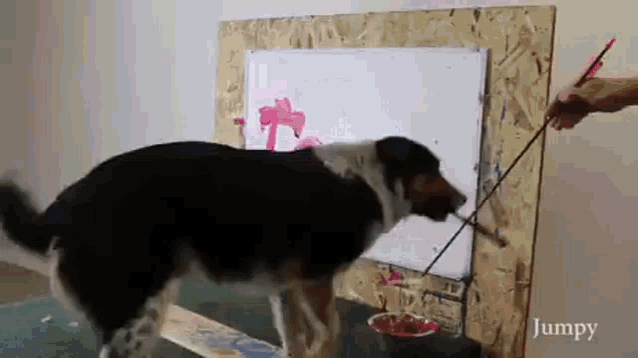 a dog is being painted on a white board by a person with jumpy written on the bottom