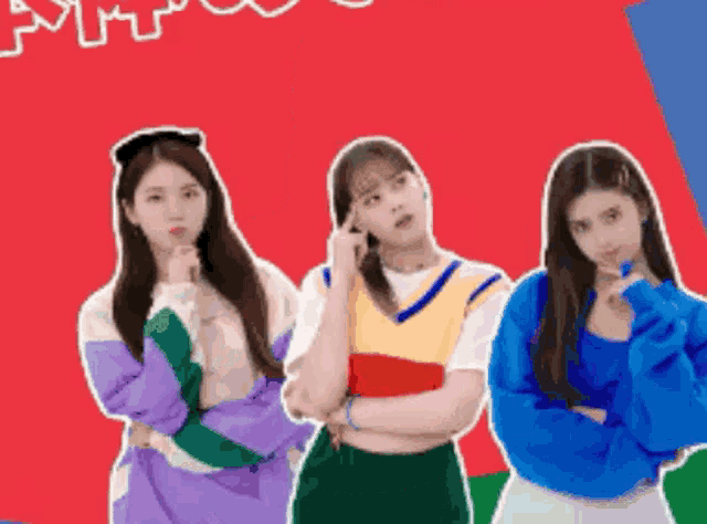 three girls standing next to each other on a red background