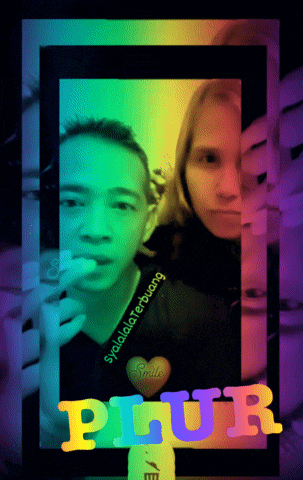 a picture of a man and a woman in a frame with the word plur on it