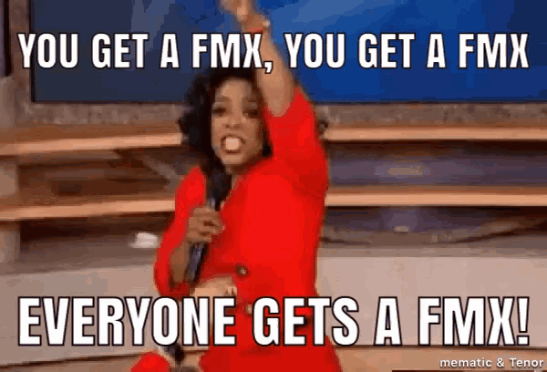 a woman in a red dress is holding a microphone and says " everyone gets a fmx "