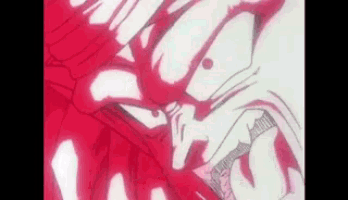 a close up of a cartoon character 's face with a red light coming out of his mouth .