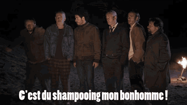a group of men standing next to each other with the words c'est du shampooing mon bonhomme