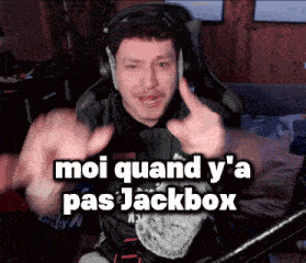 a man wearing headphones says moi quand y a pas jackbox