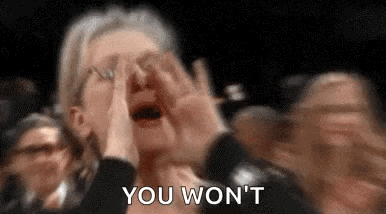 a woman is crying in a crowd of people while holding her hands to her face and saying `` you won 't '' .