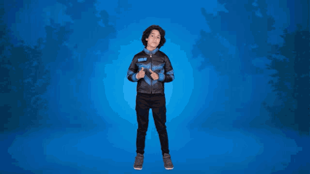 a young boy wearing a jacket that says ' thunder ' on it