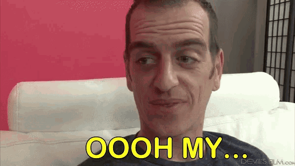 a man sitting on a couch with the words oooh my