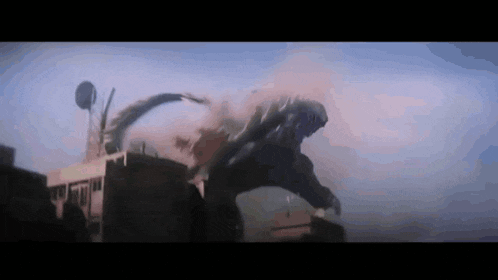 a monster is flying through the air in a city .