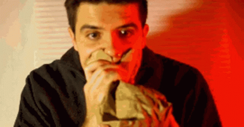 Nervous Breating Into Bag GIF - Nervous Breating Into Bag Anxiety GIFs
