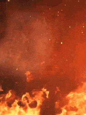 a close up of a fire with a dark background .