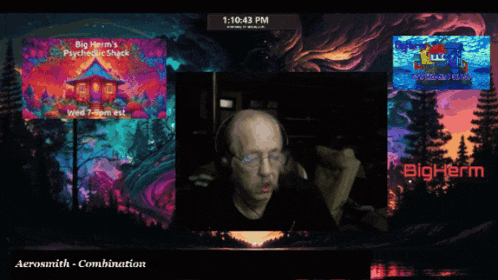 a man is sitting in front of a screen that says big herman 's psychic shack on it