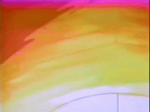 a close up of a colorful painting with a rainbow of colors