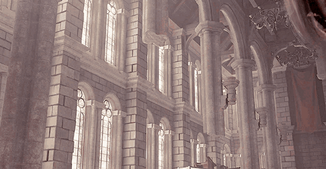 a large building with columns and arched windows