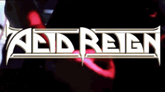 a close up of a person playing a guitar in front of a logo for acid reign
