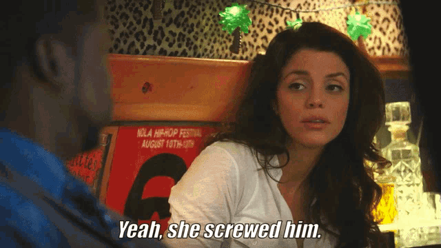 a woman says yeah she screwed him in front of a poster for the nola hip-hop festival